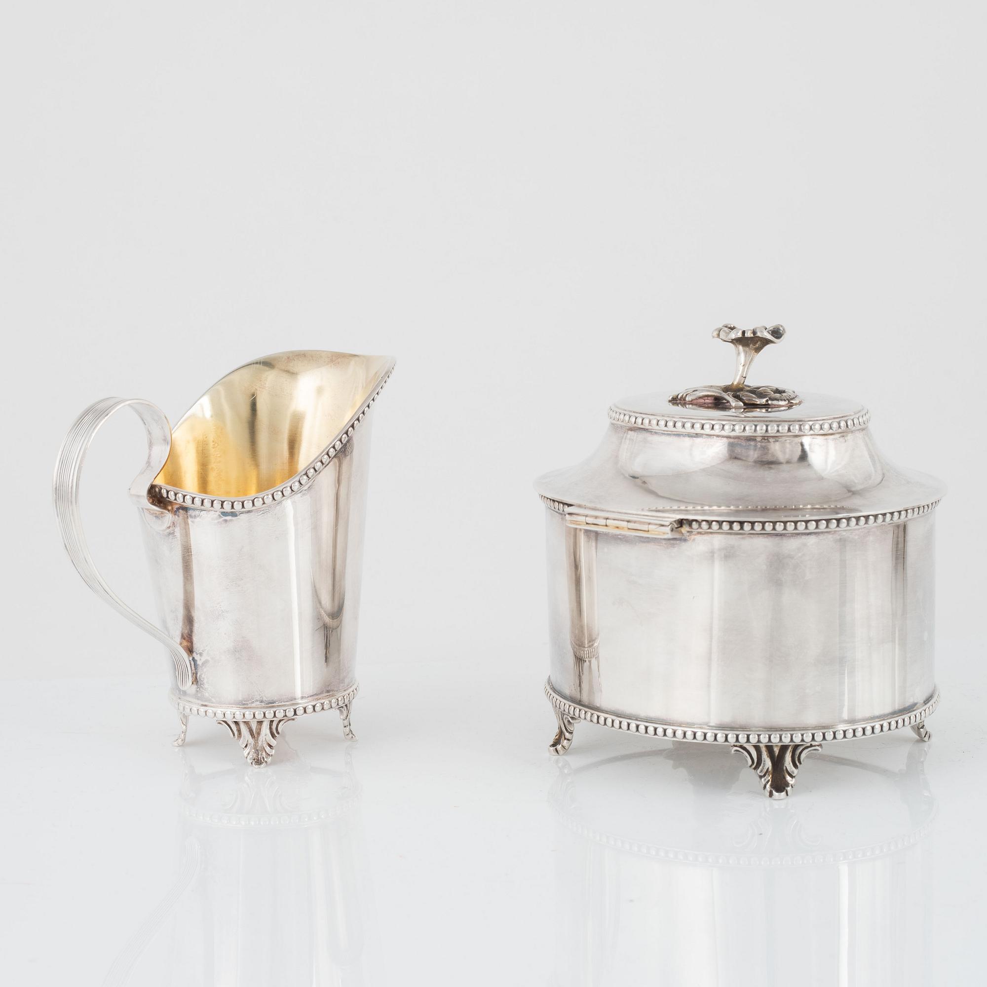 A Swedish Silver Coffee Pot, Creamer and Sugar Bowl, Eric Löfman, MGAB, Uppsala 1976-77.