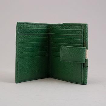 A wallet by Gucci.