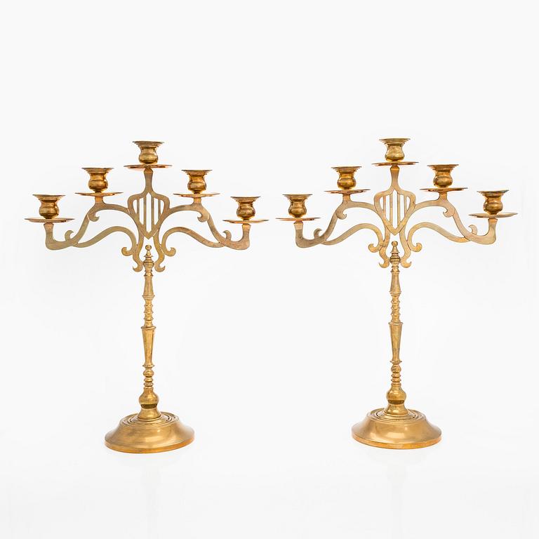 A pair of brass candelabras, early 20th century.