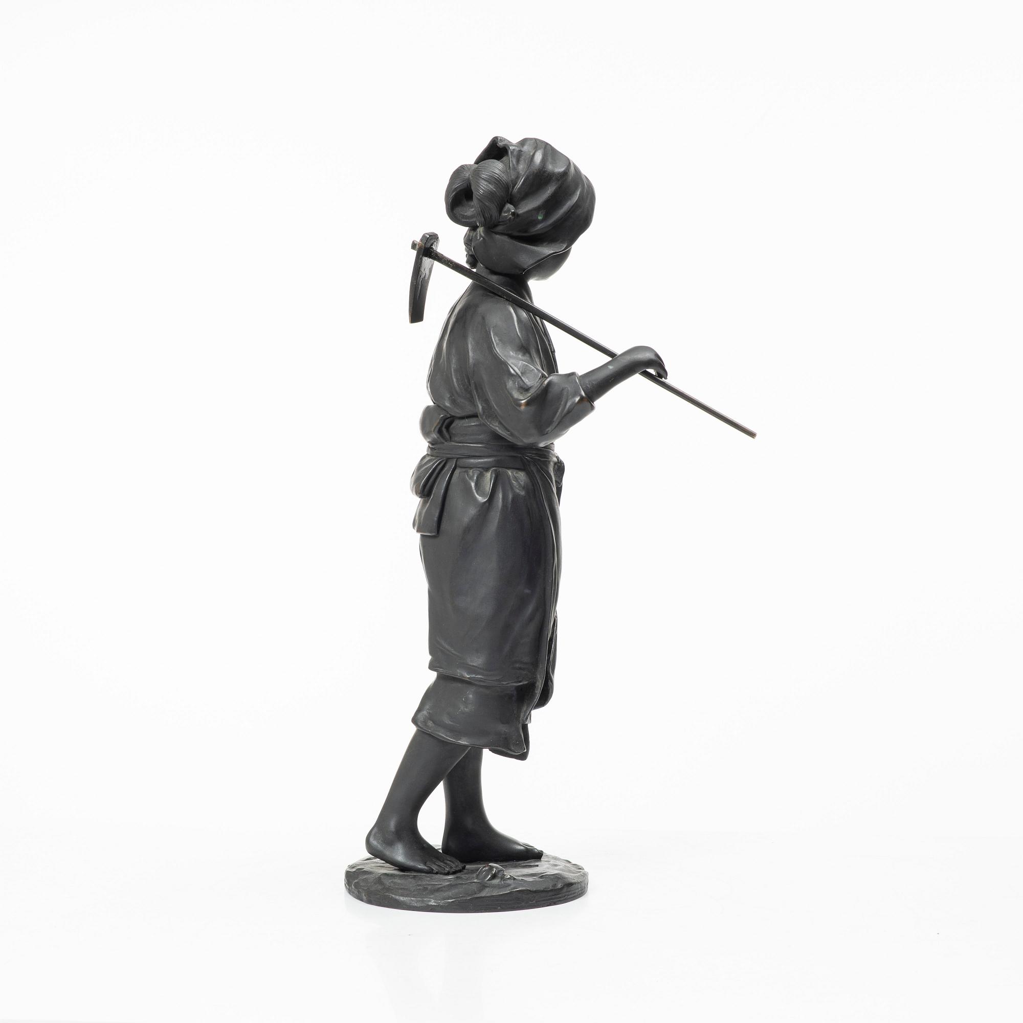 A large Japanese bronze okimono, early 1900s.