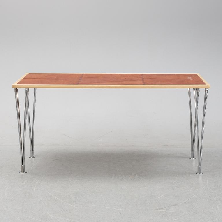 A birch and leather dining table produced by Mathsson International, 21th century.