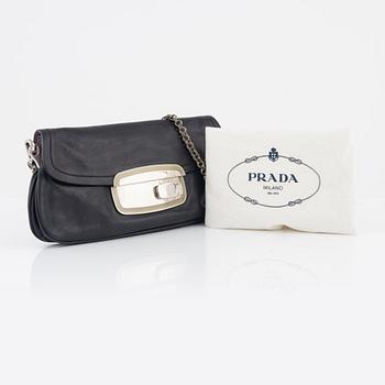 Prada, a handbag.