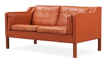 80. A Børge Mogensen brown leather two-seated sofa, Fredricia Stolefabrik, Denmark.