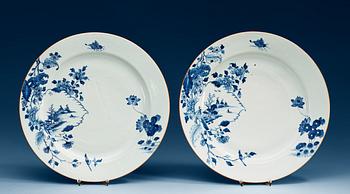 1704. A pair of blue and white chargers, Qing dynasty, Qianlong (1736-95).