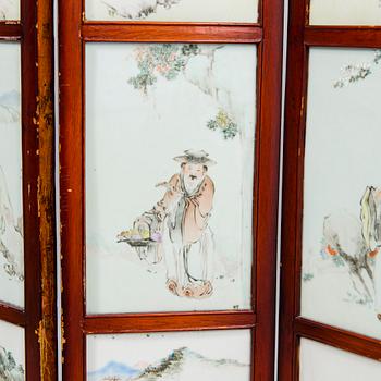 A Chinese folding screen with 48 porcelain tiles, late Qing dynasty, signed Ren Huanzhang, and dated 1881.