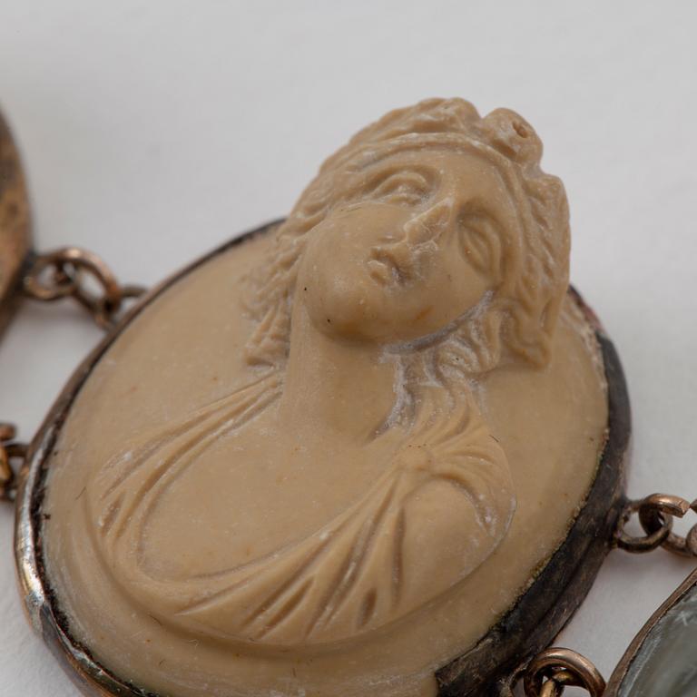 Silver and lava cameo necklace and bracelet.