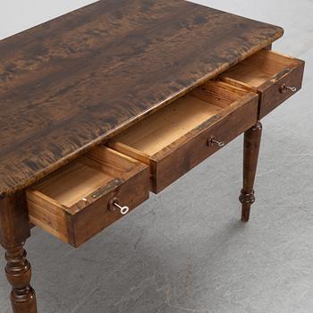 An early 20th Century birch writing desk.