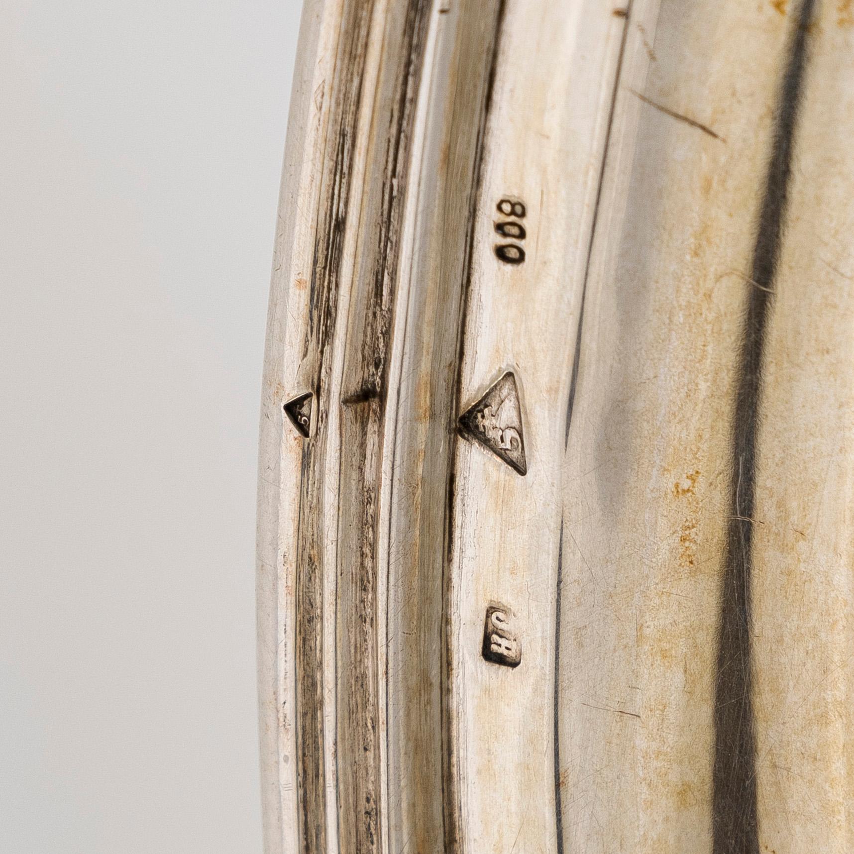 Serving platter, silver, Czechoslovakia, and twelve serving utensils, Alexander Sturm, Austria-Hungary, 1867-1941.