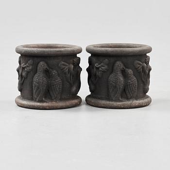 A pair of Anna Petrus cast iron jardinières, Näfveqvarn, Sweden.