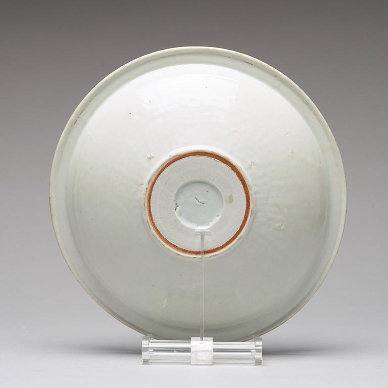 A light celadon glazed dish, Ming dynasty (1368-1644).