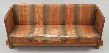 Axel Einar Hjorth, a 'Lovö' stained pine sofa, Nordiska Kompaniet, Sweden 1930's.