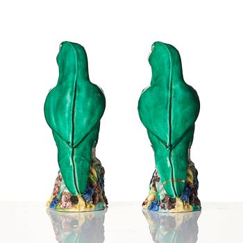 A pair of green glazed parrots, late Qing dynasty.