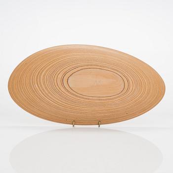 Tapio Wirkkala, a plywood dish, signed TW.