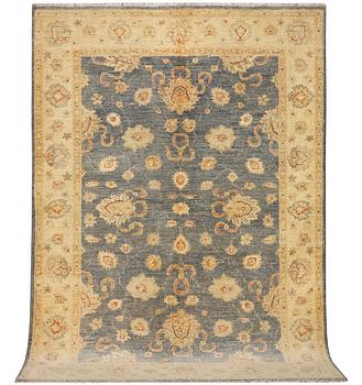 An Ushak rug, c. 242 x 165 cm.