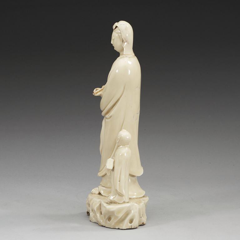 A blanc de chine figure of Guanyin with an attendant, Qing dynasty, 18th Century.