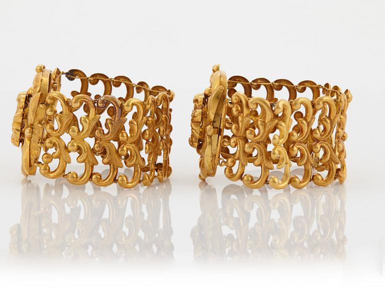 A pair of 19th century 18K gold bracelets.