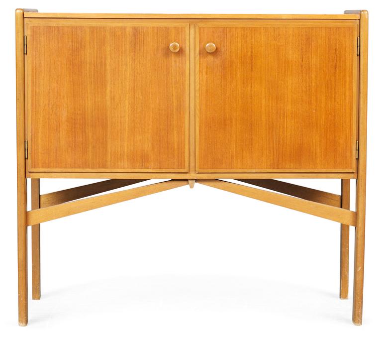 A Carl-Axel Acking teak and beech cabinet by Svenska Möbelfabrikerna Bodafors, Sweden.
