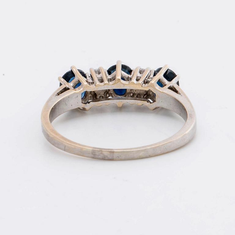 RING 18k whitegold w 3 sapphires 5 x 4 mm and 4 brilliant-cut Diamonds 0,12 ct in total engraved.