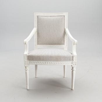 A late 18th century Swedidh Gustavian open arm chair.