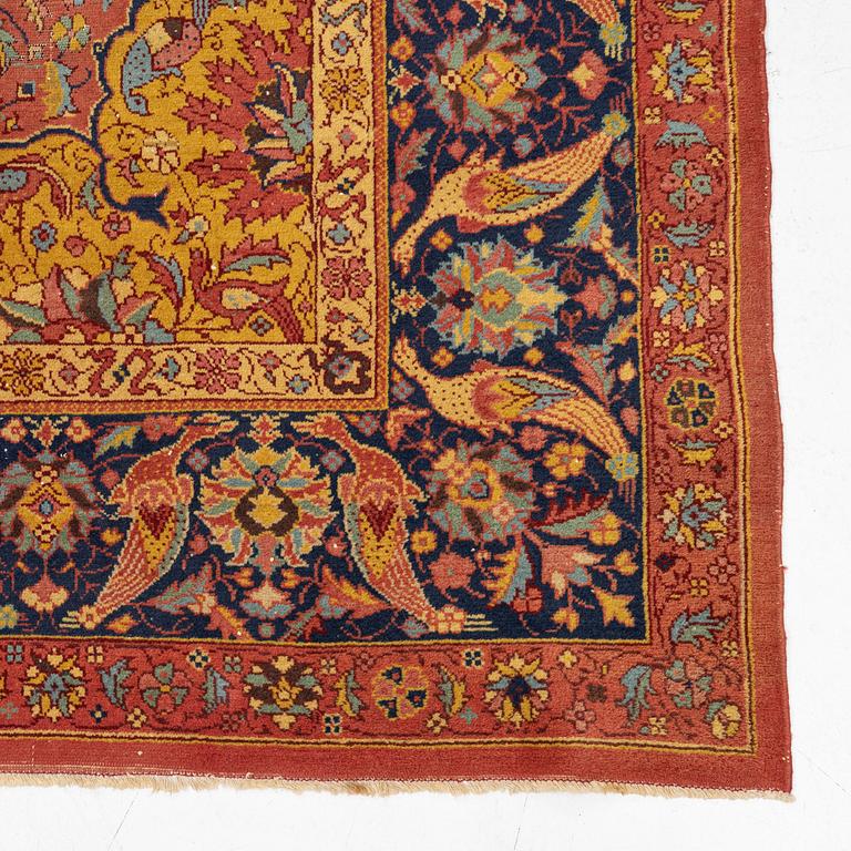 A carpet, antique/semi-antique Turkish/Indian, approx. 330 x 234 cm.