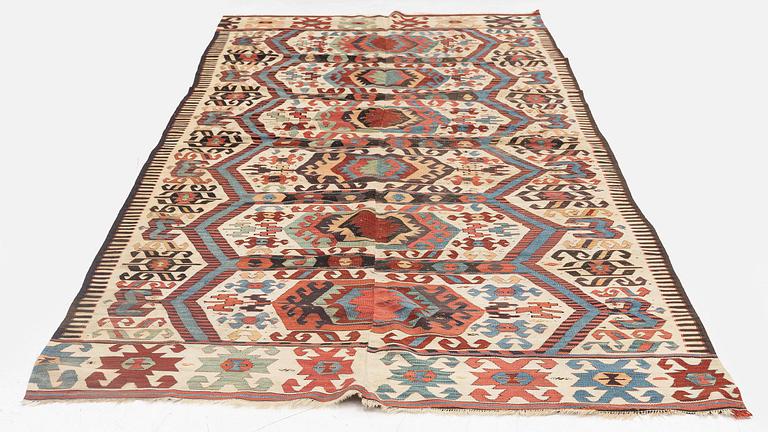 An antique central Anatolian kilim, possibly Konya, c. 339 x 140 cm.