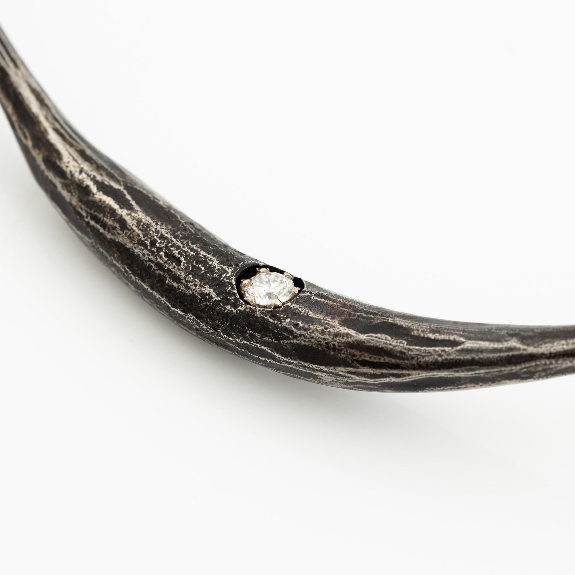 PA Lundahl-Terrs, a necklace and a bracelet, iron and round brilliant-cut diamonds.