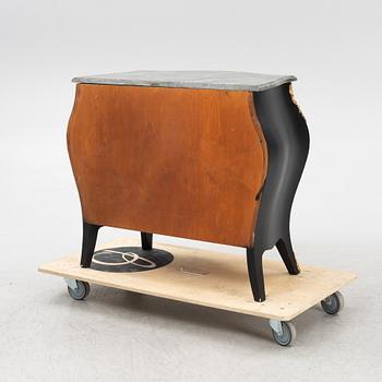 A Rococo style chest of drawers, mid 20th Century.