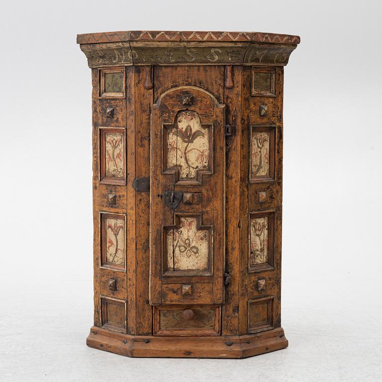 A wall cabinet, folk art, Västergötland dated 1773.