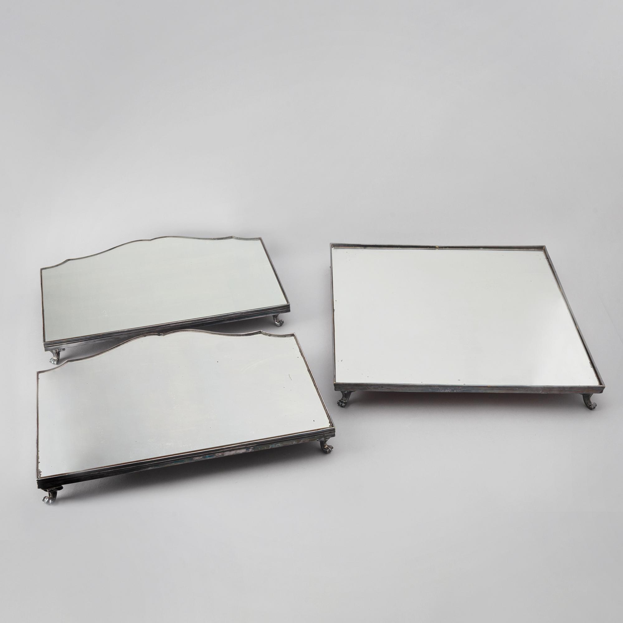 A 20th century silver plated mirror plateau.