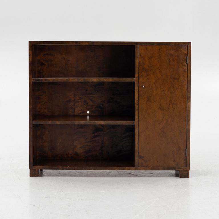 A stained birch book case with av cabinet, 1930s.