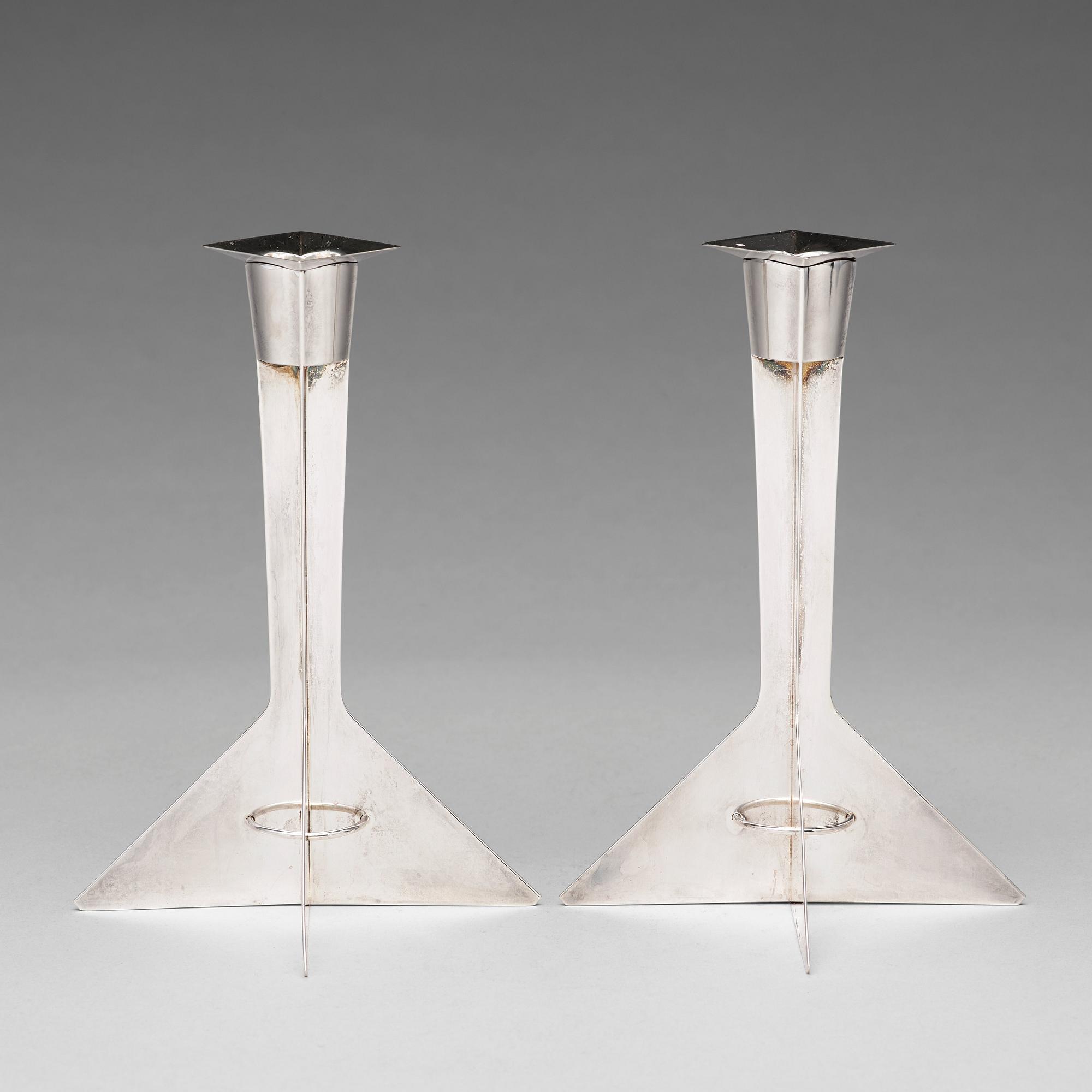 Hubert Hydman, a pair of sterling candlesticks, Stockholm 1988.