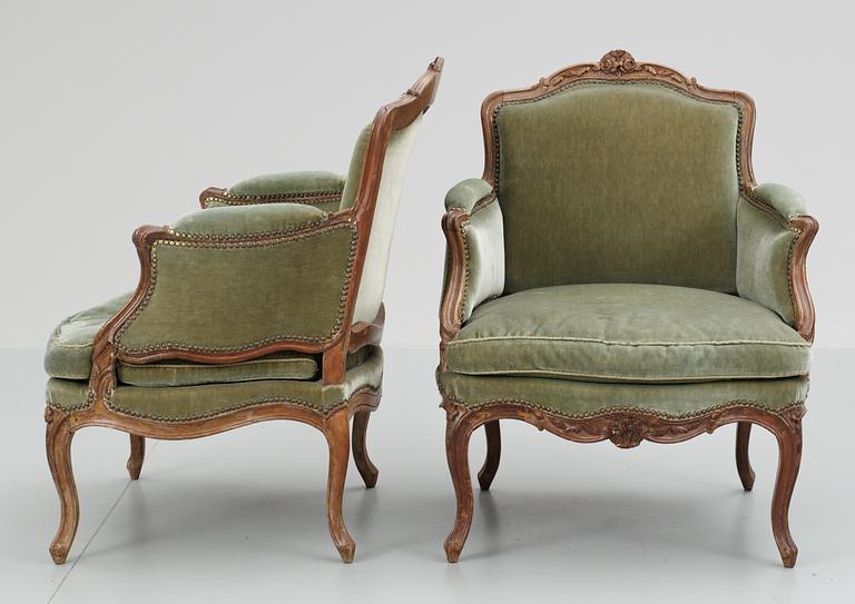 A pair of Louis XV 18th century bergeres. Stamped "P ROUSSEL", with inventory number and labeled  "Monsieur Villeboeuf".