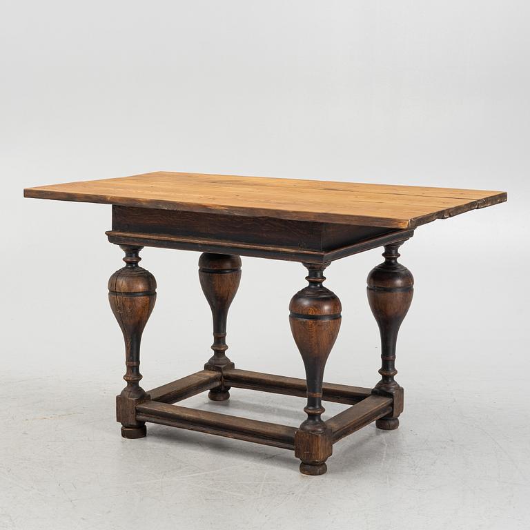 An oak Baroque table, 18th Century.