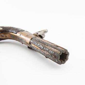 A British percussion pistol, 19th century.