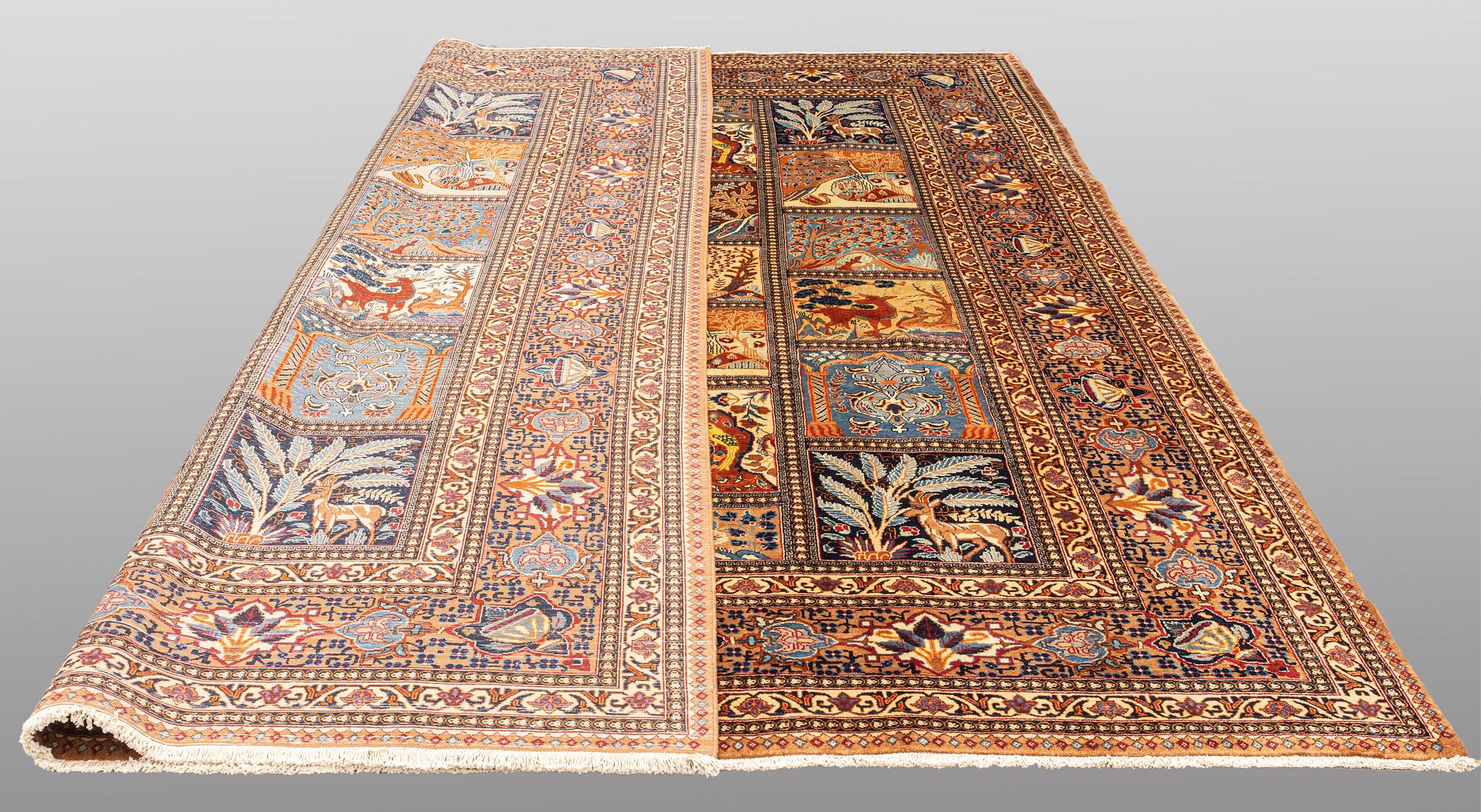 A carpet, Figural Kashmar, ca 373 x 298 cm.