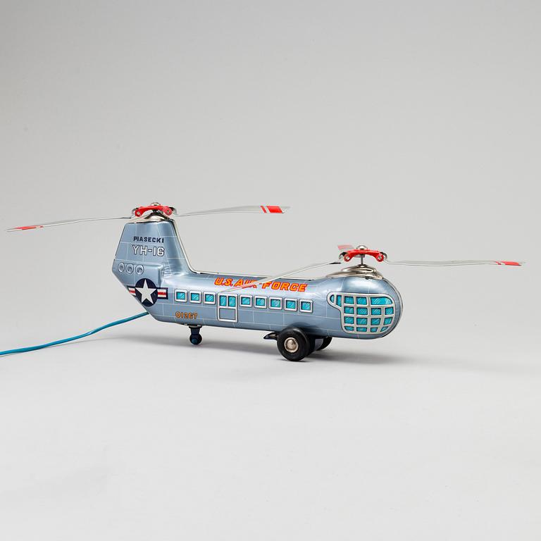 A toy metal car "Sunday Driver", Kosuge, Japan, and "Giant Helicopter", YF, Japan. 1960s.