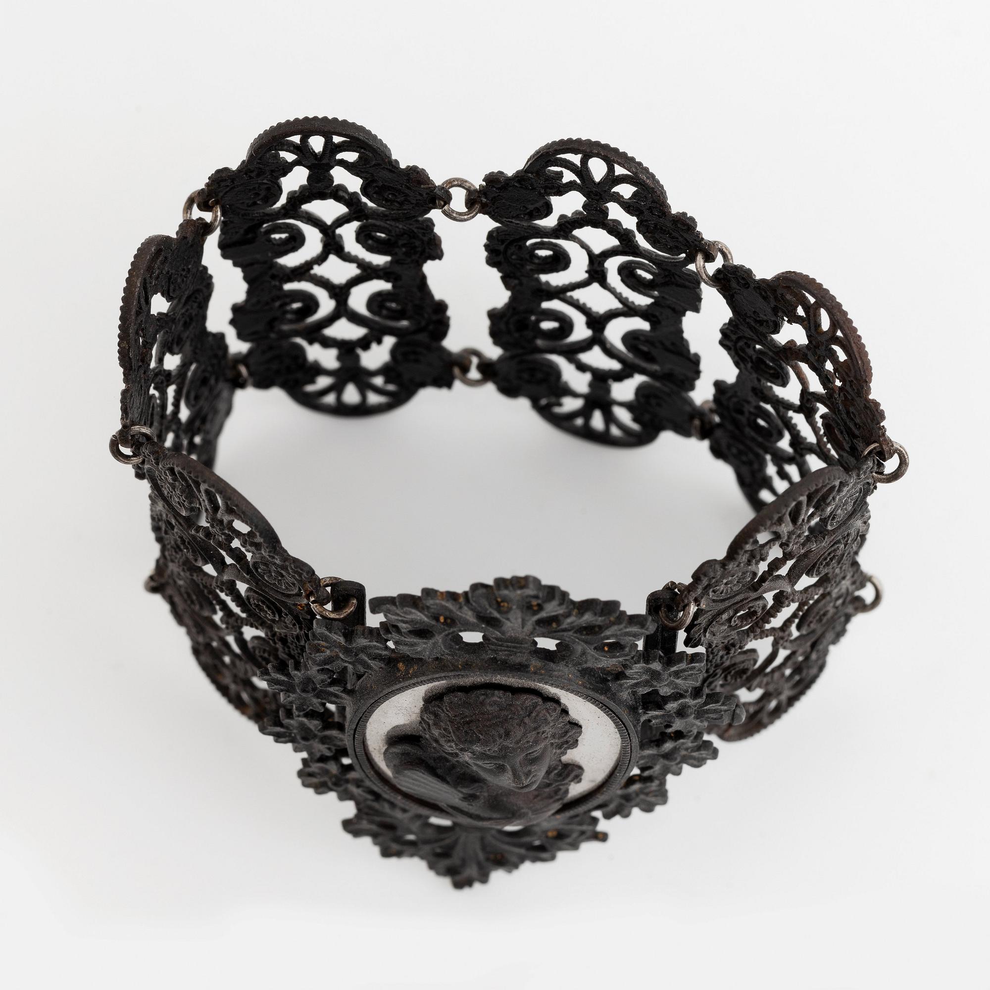 A Berlin iron and steel bracelet with a cameo.