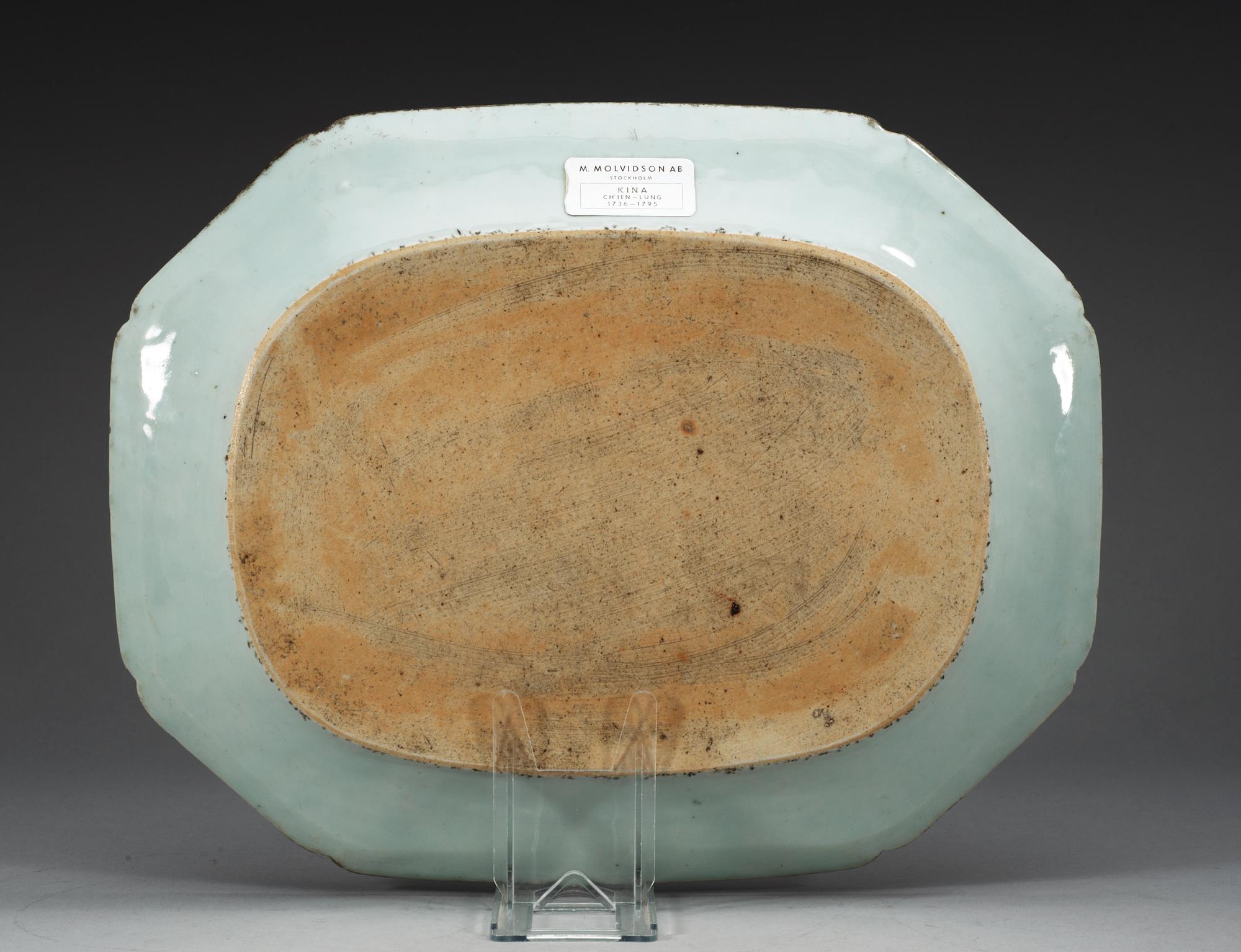 A famille rose 'double peacock' serving dish, Qing dynasty, Qianlong (1736-95).