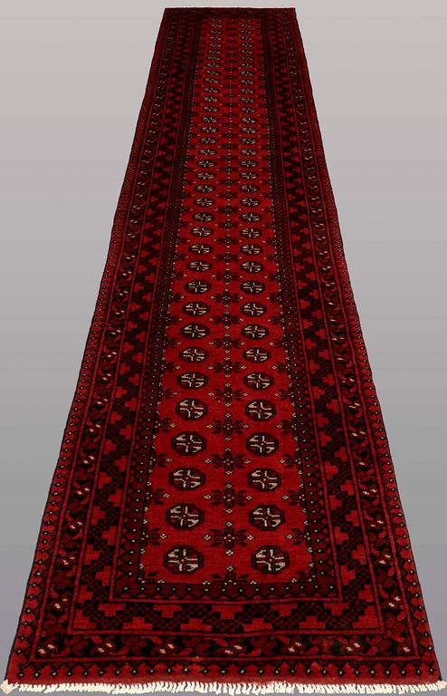 A RUNNER, Afghan, ca 498 x 83 cm.