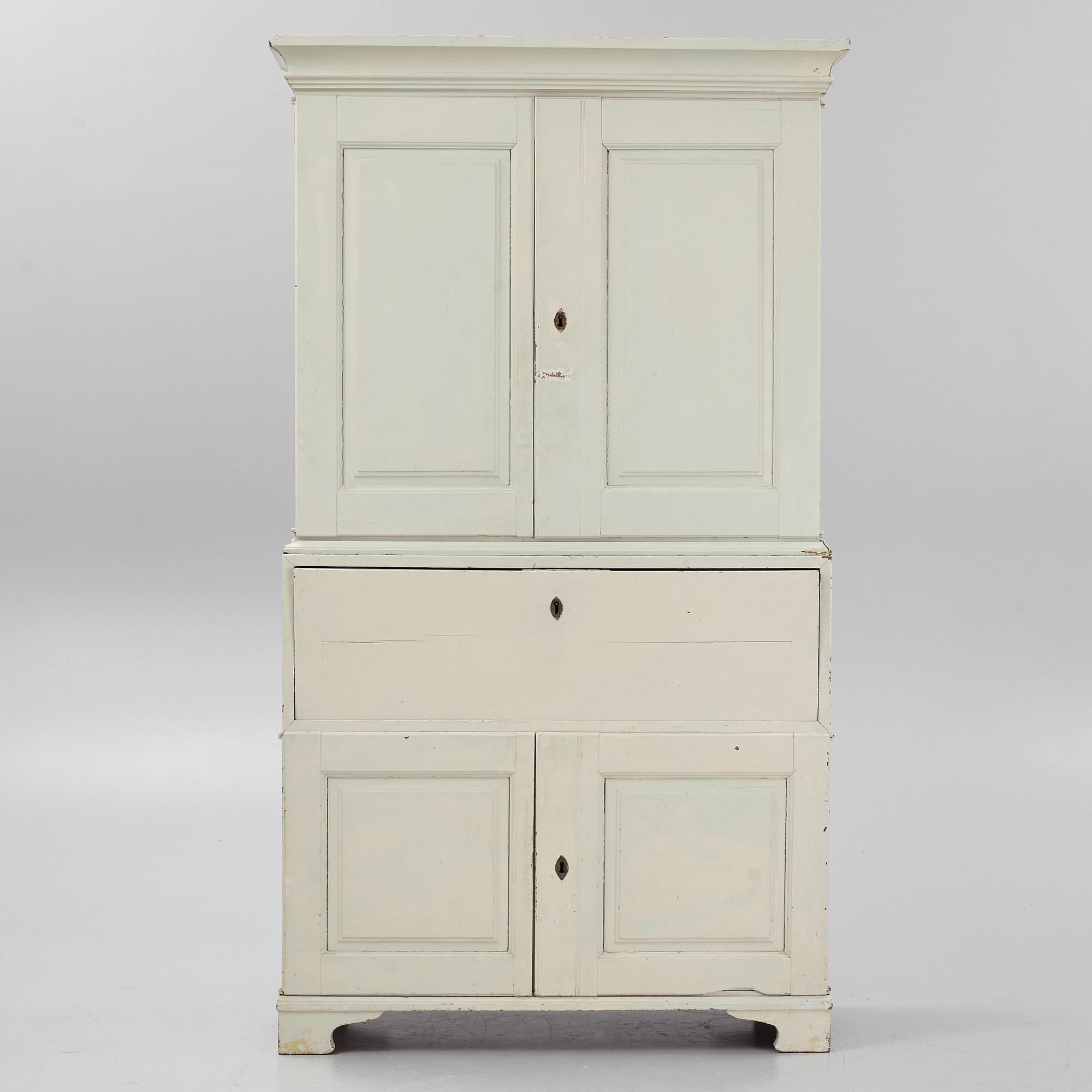 A 18th century panited cabinet.