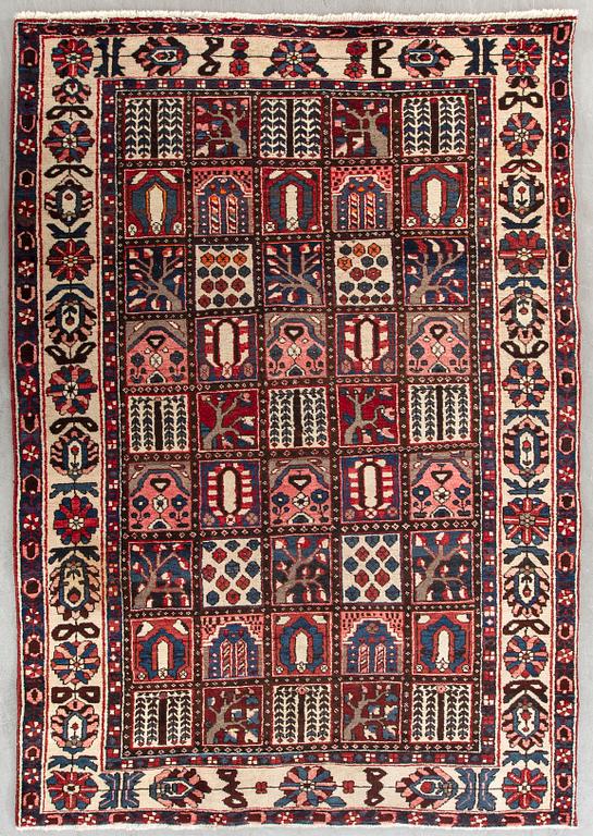 An old Bachtiari carpet ca 300 x 162 cm.