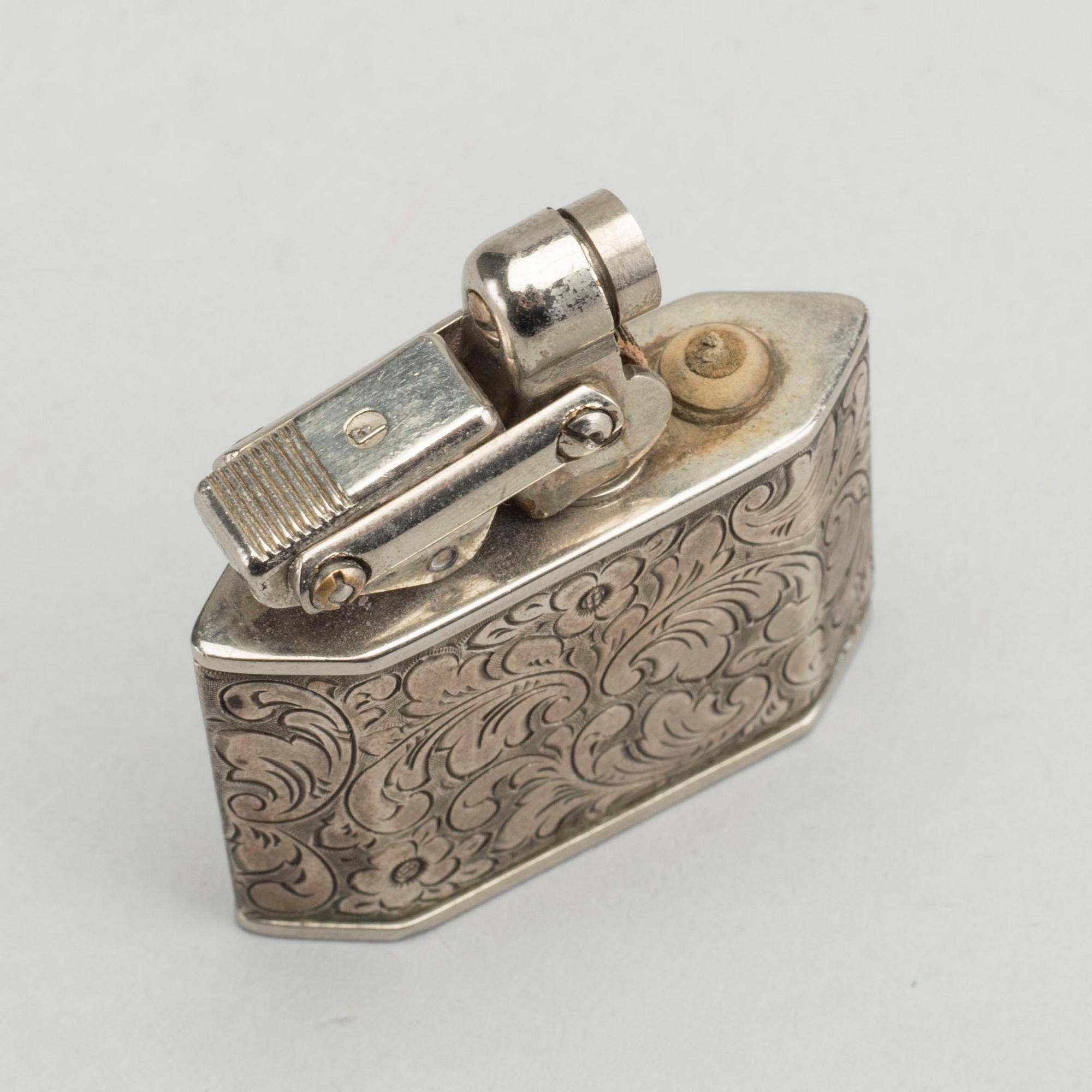 CIGARETTMUNSTYCKE SAMT TÄNDARE, silver, svenska importstämplar. 1900-talets första hälft.