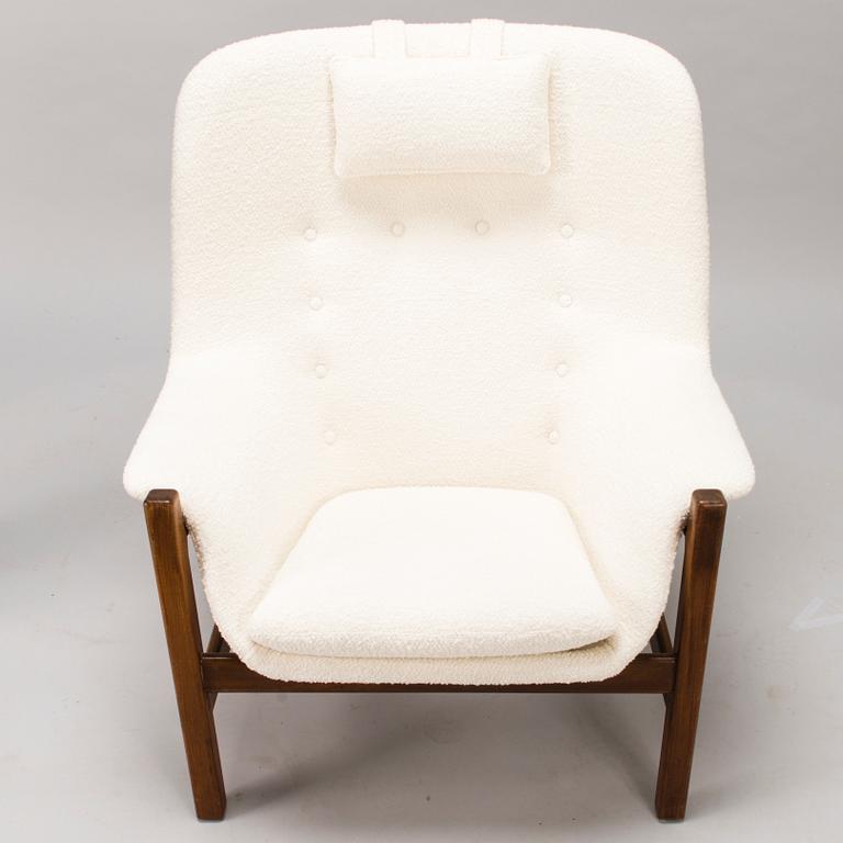 CARL GUSTAF HIORT AF ORNÄS, A 1960s 'Caravelle' armchair and ottoman for Puunveisto Oy - Wood work Ltd.