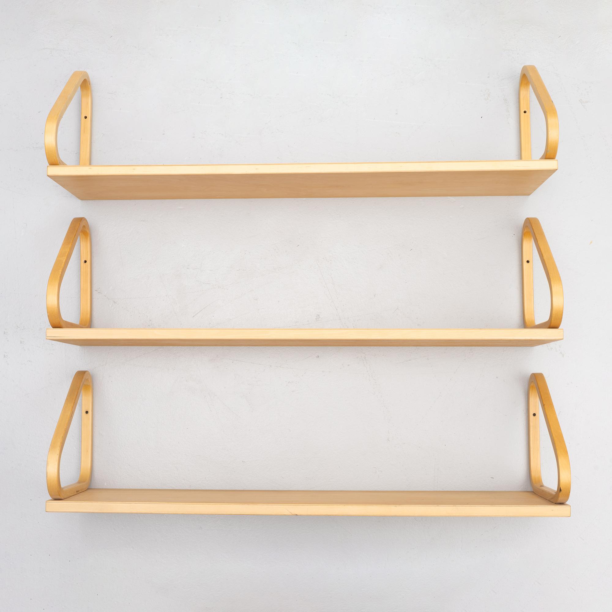 Alvar Aalto, three wall shelves, model 112B, Artek, Finland, late 20th century.