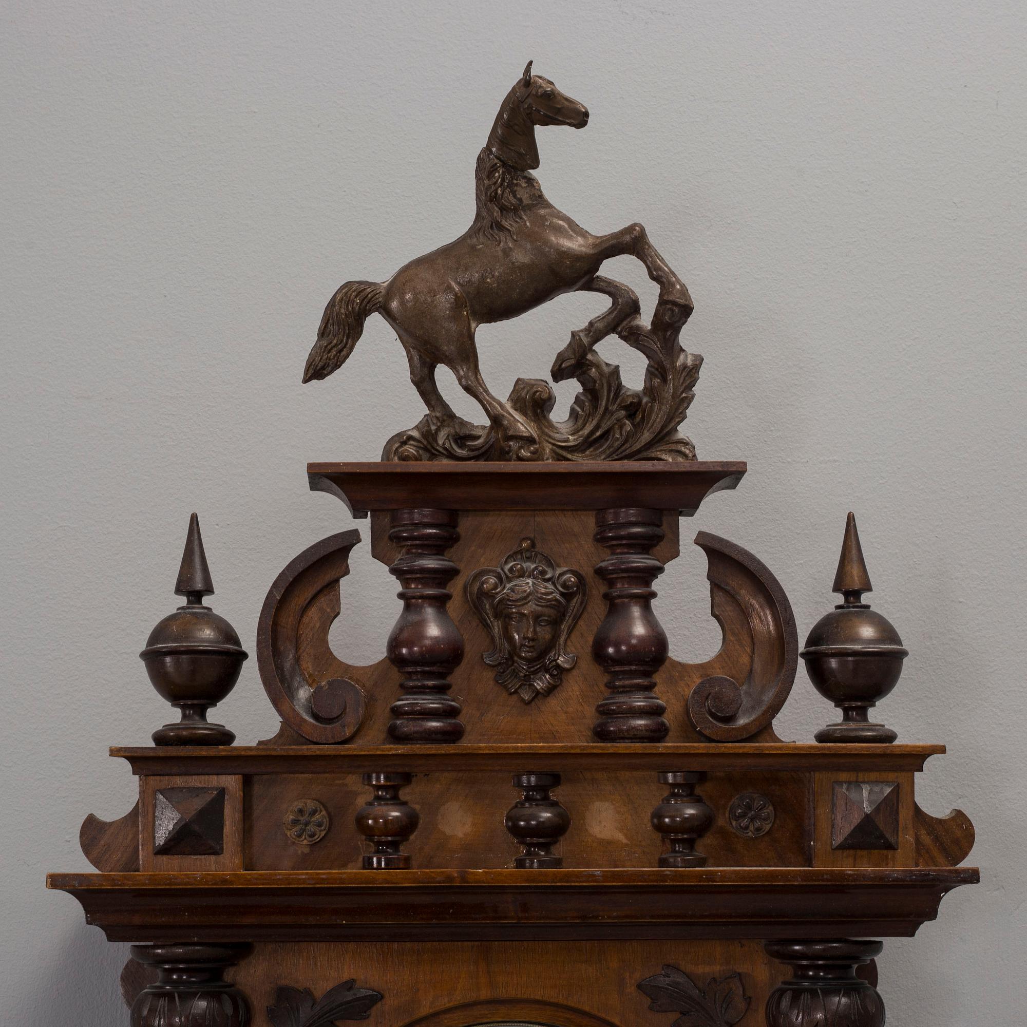 A circa 1900 Renaissance style wall clock.