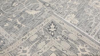 A carpet, Ziegler design, approx. 427 x 305 cm.