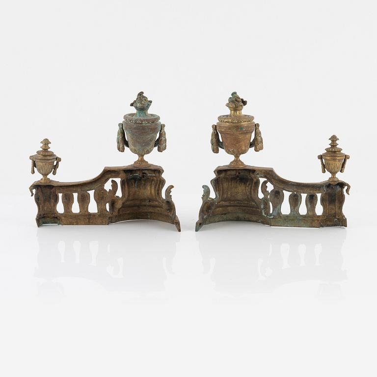 A Louis XVI style bronze grate, 19th Century.