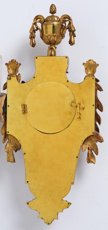 A French  Louis XVI-style wall clock, around 1900.