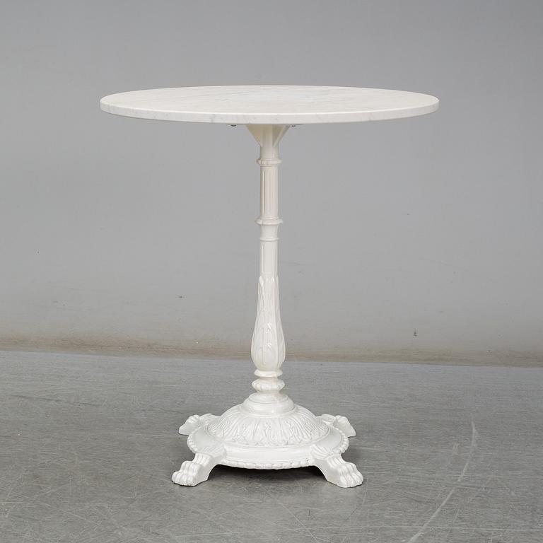 A cast iron and marble café table from Byarum.