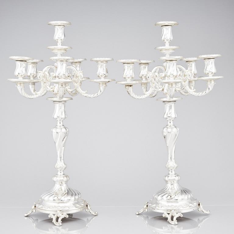 A pair of Swedish silver candelabra, mark of Gustaf Möllenborg (Carl Teodor Feron), Stockholm 1896.